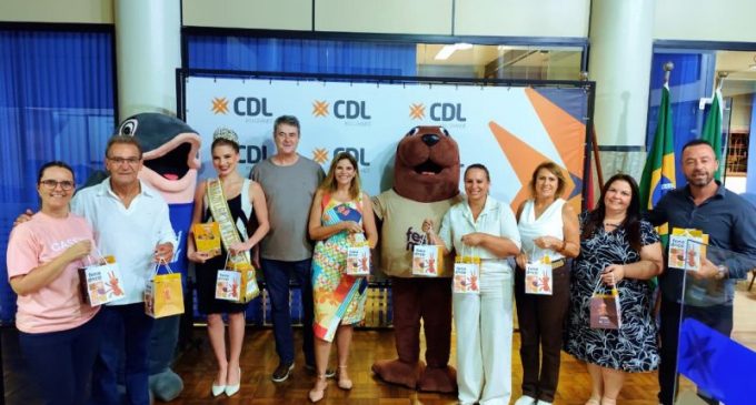 Em visita a Rio Grande, comissão da Fenadoce prestigia o Festimar 2026